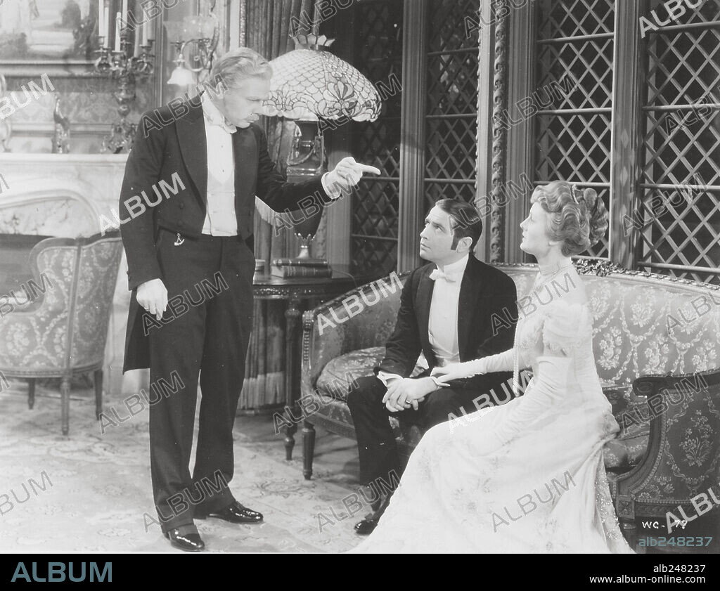 DONALD COOK, MARY ASTOR and PAUL MUNI in THE WORLD CHANGES, 1933, directed by MERVYN LEROY. Copyright WARNER BROTHERS.