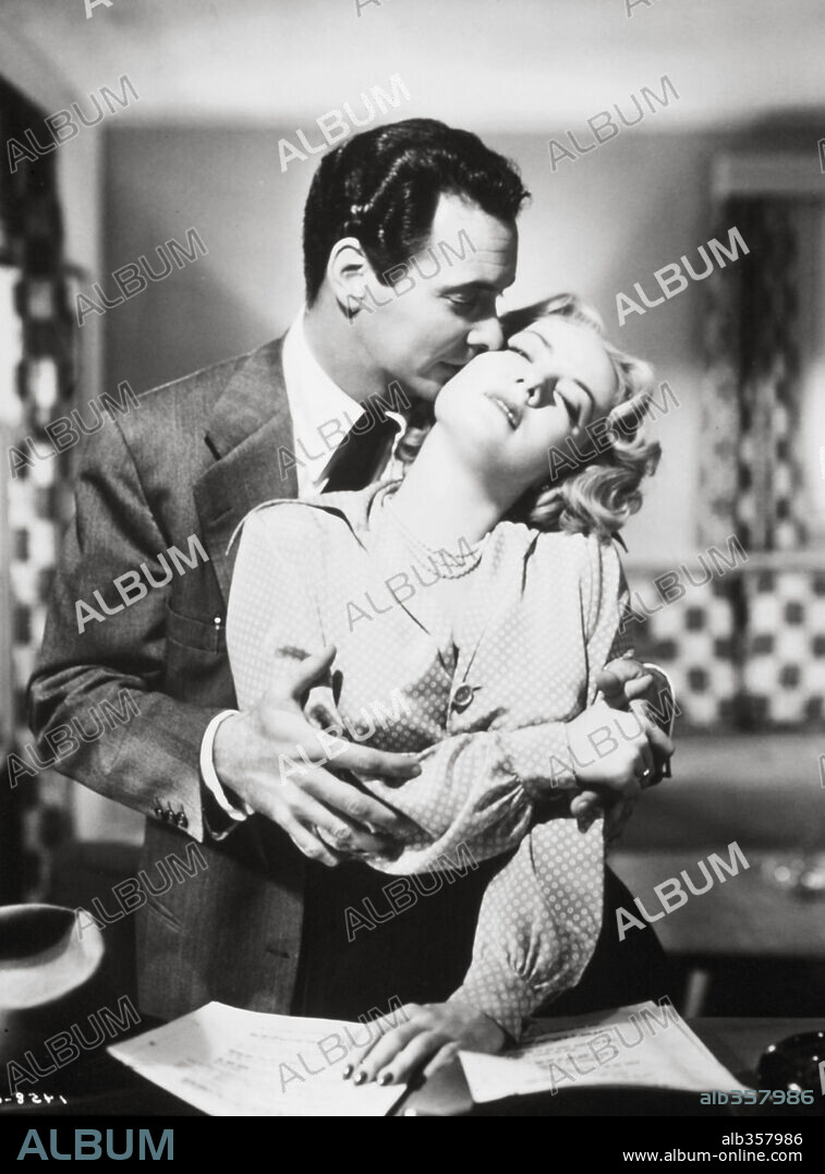 AUDREY TOTTER and BARRY SULLIVAN in TENSION, 1950, directed by JOHN BERRY. Copyright M.G.M.