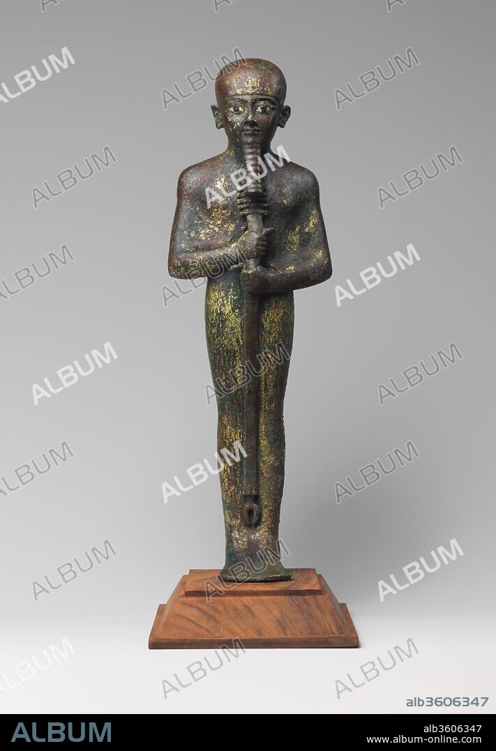 Ptah Statue. Dimensions: H. 29.5 cm (11 1/2 in). Date: ca. 1070-712 B.C..
The great Egyptian god Ptah was a deity whose many aspects include those of both a creator god and a god who listens to individuals' prayers. Ptah's name was commonly accompanied by the epithet Nefer-Her, or "Benevolent of Face," a description suited to the serene and open features of this particular image.
The statuette is remarkable for its beauty and size, state of preservation, elaborate manufacture provisions, and its demonstrable date to the Third Intermediate Period. The Third Intermediate Period was, as its name suggests, essentially a sort of Egyptian Middle Ages: political power was fractured, but temples became magnets for art and invention expressed in the metal images of gods and temple functionaries. They were large and finely executed by diverse and inventive means.
A statue like this would have been housed in a wooden shrine; when the shrine doors were open, the statue might have been the recipient of offerings and incense or the focus of ritual chants and music. When its period of use was over, the still sacred statuette would be deposited in a cache within the temple walls.