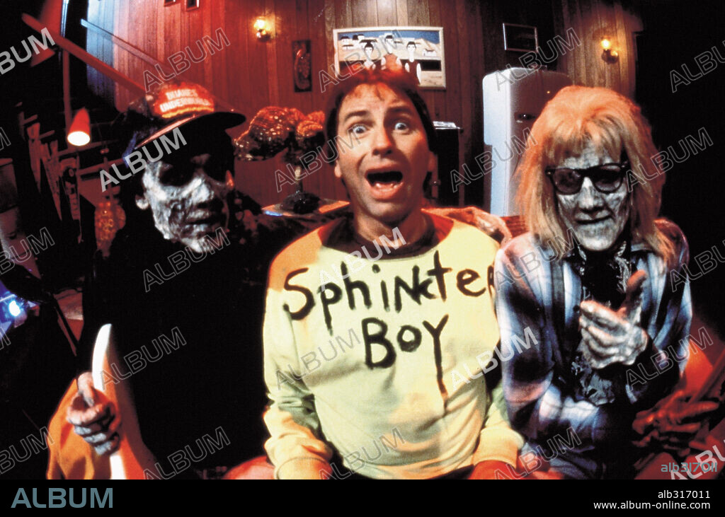 JOHN RITTER en PERMANEZCA EN SINTONÍA, 1992 (STAY TUNED), dirigida por PETER HYAMS. Copyright MORGAN CREEK/WARNER BROS.