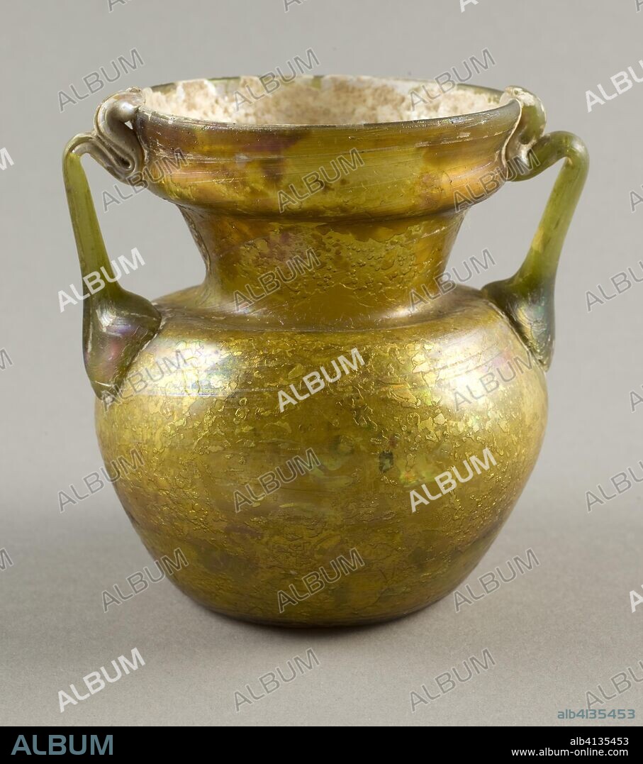 ANCIENT ROMAN. Jar. Roman; Levant or Syria. Date: 201 AD-500 AD. Dimensions: H. 9.8 cm (3 7/8); diam. 10.5 cm (4 1/8 in.). Glass, blown technique. Origin: Syria.