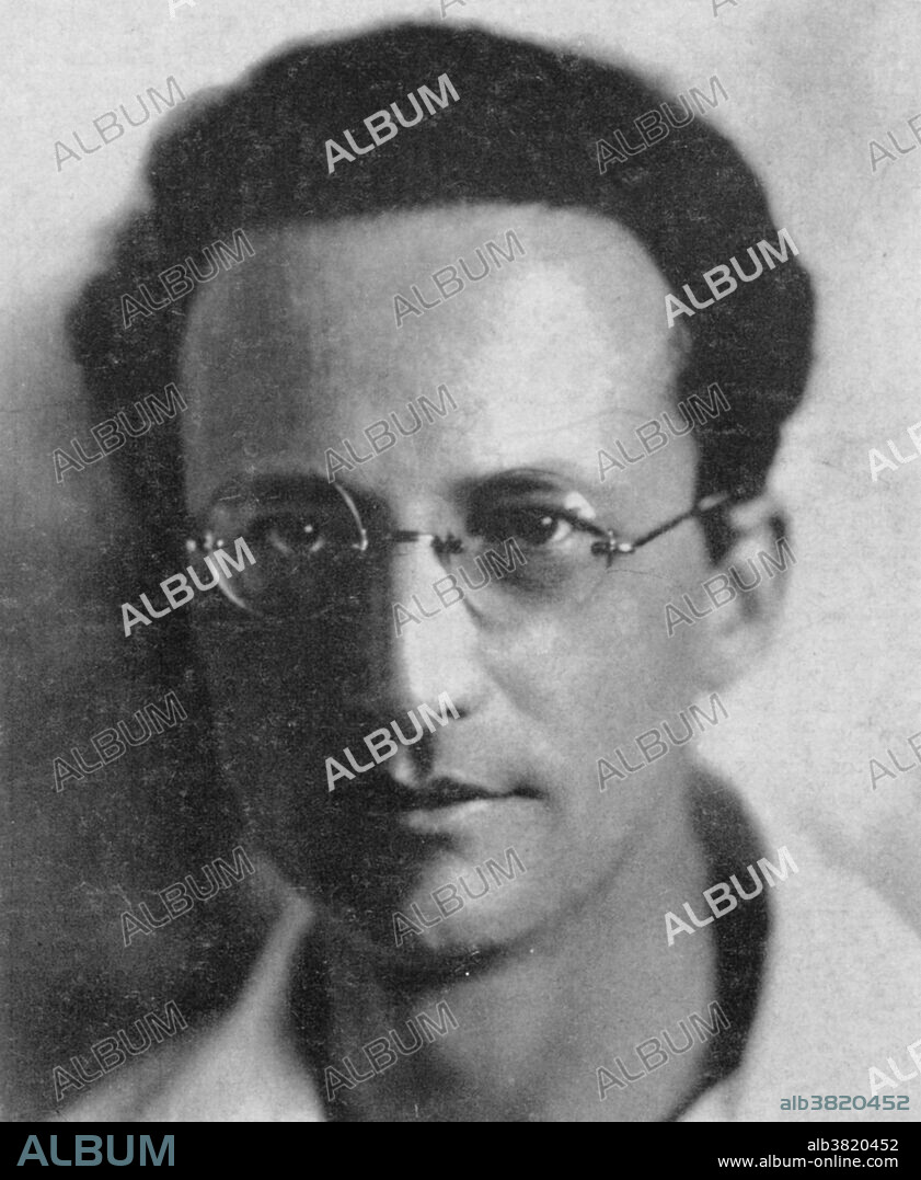 Caption reads: "Erwin Schrodinger devised his wave equation by extending De Broglie's that waves are associated with particles to the electrons moving around the nucleus. This photograph was made in 1929, four years after he had published his second equation." Erwin Rudolf Josef Alexander Schrodinger (August 12, 1887 - January 4, 1961) was an Austrian physicist and theoretical biologist who was one of the fathers of quantum mechanics, and is famed for a number of important contributions to physics, especially the Schrodinger equation, for which he received the Nobel Prize in Physics in 1933. In 1935, after extensive correspondence with personal friend Albert Einstein, he proposed the Schrodinger's cat thought experiment. The philosophical issues raised by Schrodinger's cat are still debated today and remains his most enduring legacy in popular science, while Schrodinger's equation is his most enduring legacy at a more technical level. He died in 1961 of tuberculosis at the age of 73. The huge crater Schrodinger, on the far side of the Moon is named after him. The Erwin Schrodinger International Institute for Mathematical Physics was established in Vienna in 1993.