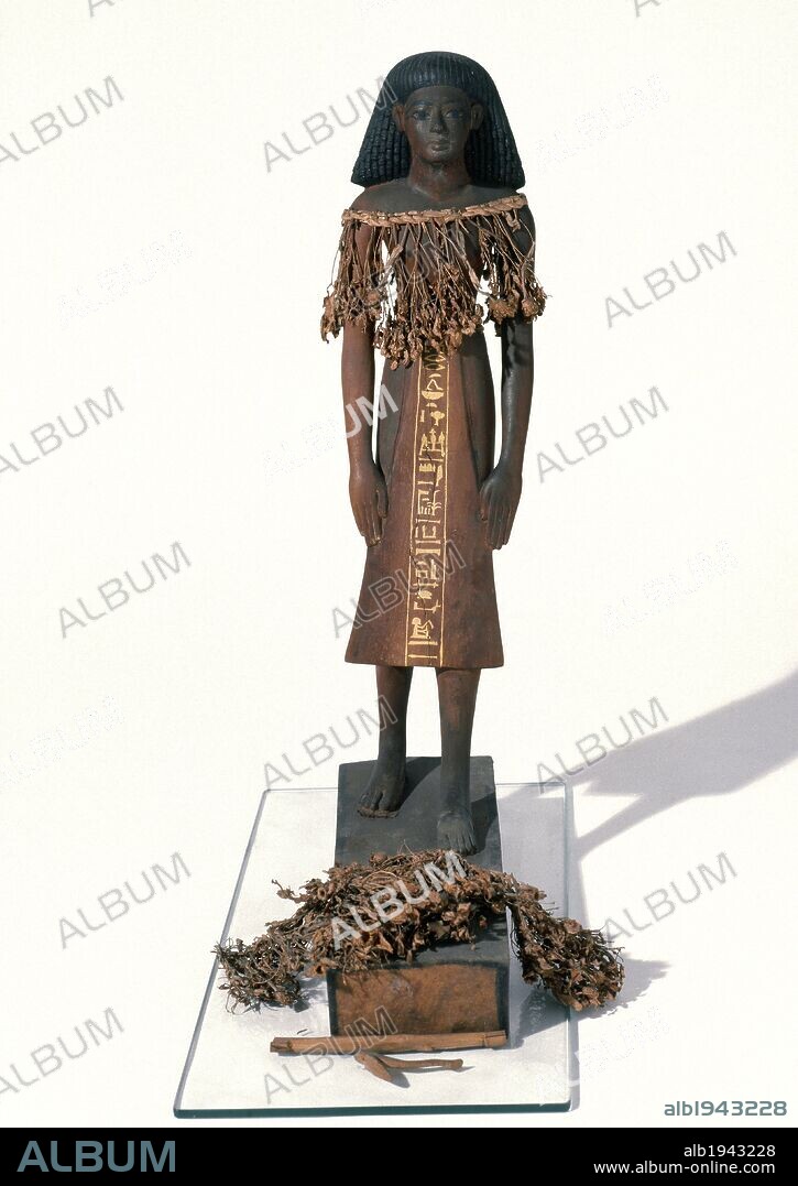 ARTE EGIPCIO. EGIPTO. Estatua de madera policromada del Arquitecto KHA. Destinada a la TUMBA DE KHA (Der el Medina). Fechada hacia el 1400 a. C. (XVIII DINASTIA). Museo Egipcio. Turín. Italia.