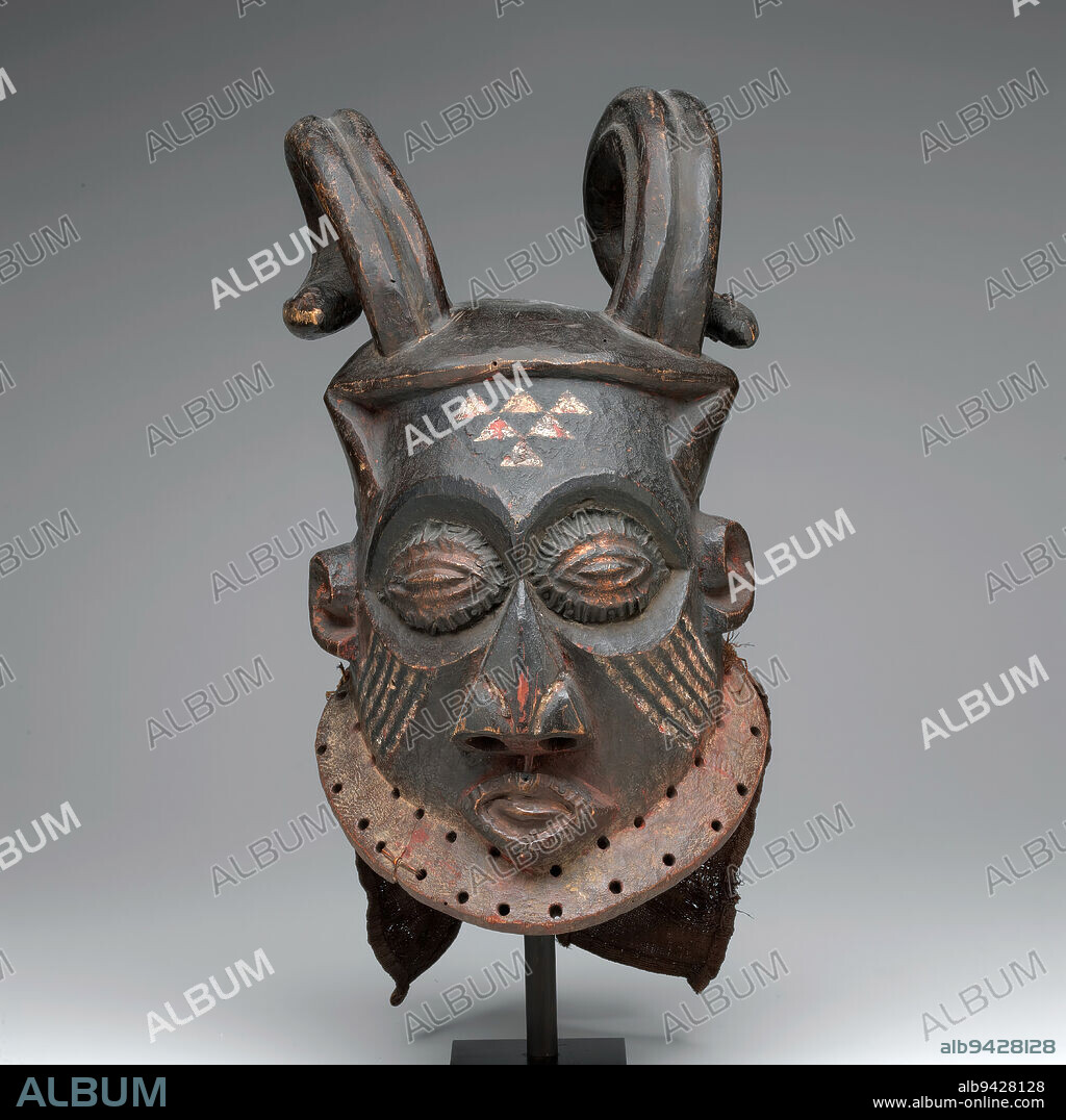 Horned Forest Spirit Mask, 20th century, 9 x 9-3/16 x 17-1/4 in. (22.9 x 23.3 x 43.8 cm), Wood, cloth, copper, pigment, plant fibers, Democratic Republic of the Congo, 20th century.