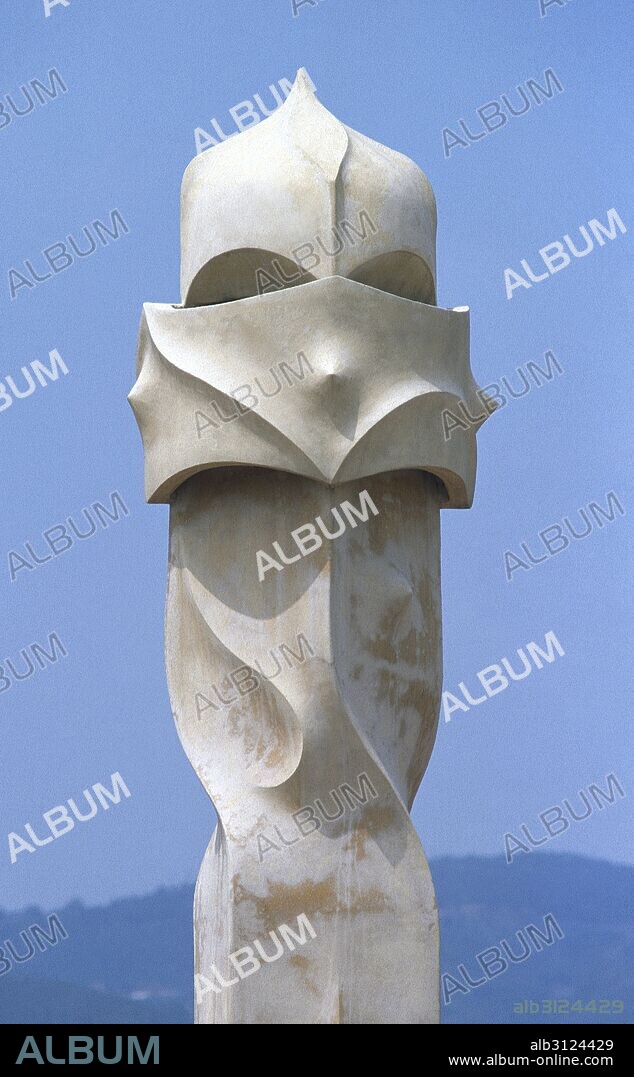 Spain, Barcelona. Casa Mila or La Pedrera. Modernist building by Antonio Gaudi, 1906-1912. Chimney shaped like a warrior. Roof terrace.
