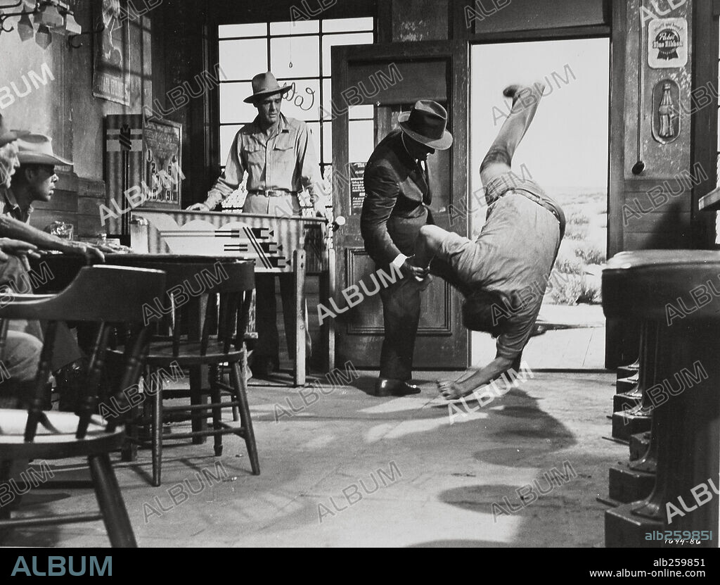 ERNEST BORGNINE and SPENCER TRACY in BAD DAY AT BLACK ROCK, 1955, directed by JOHN STURGES. Copyright M.G.M.