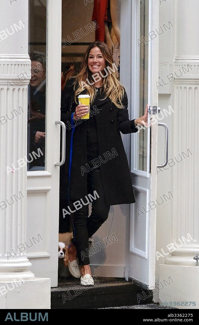 March 27, 2017 - New York, NY, United States - March 27, 2017 New York City....Kelly Bensimon and daughter Sea Louise Bensimon walking their dogs in the rain on March 27 2017 in New York City. 27/03/2017