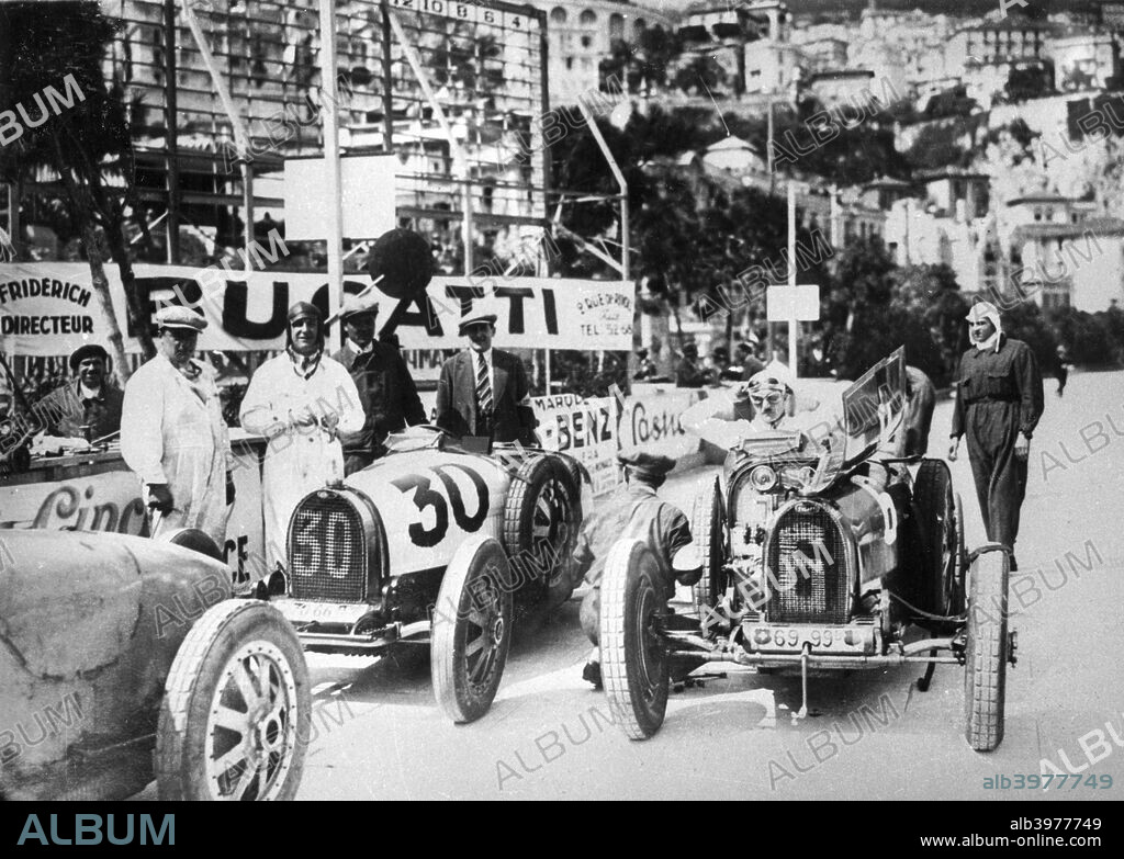 Scene during practice for the Monaco Grand Prix, 1929. Competitors with their cars during practice for the inaugural Grand Prix at the famous street circuit. The number 30 car is the Bugatti of Mario Lepori, who went on to finish 7th in the race, which was won by 'W Williams' (William Grover-Williams), also driving a Bugatti.