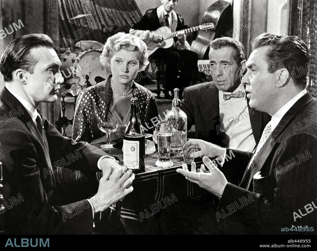 EDMOND O'BRIEN, HUMPHREY BOGART and WARREN STEVENS in THE BAREFOOT CONTESSA, 1954, directed by JOSEPH L. MANKIEWICZ. Copyright UNITED ARTISTS.