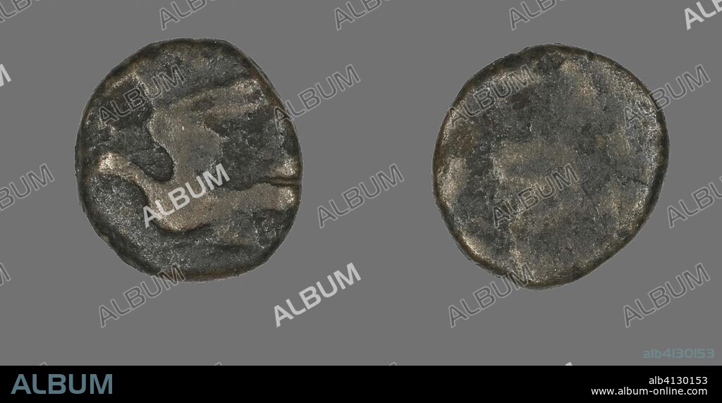 ANCIENT ROMAN. Coin Depicting a Dove. Greek or Roman. Date: 250 BC-150 BC. Dimensions: Diam. 1.4 cm; 2.18 g. Bronze. Origin: Roman Empire.