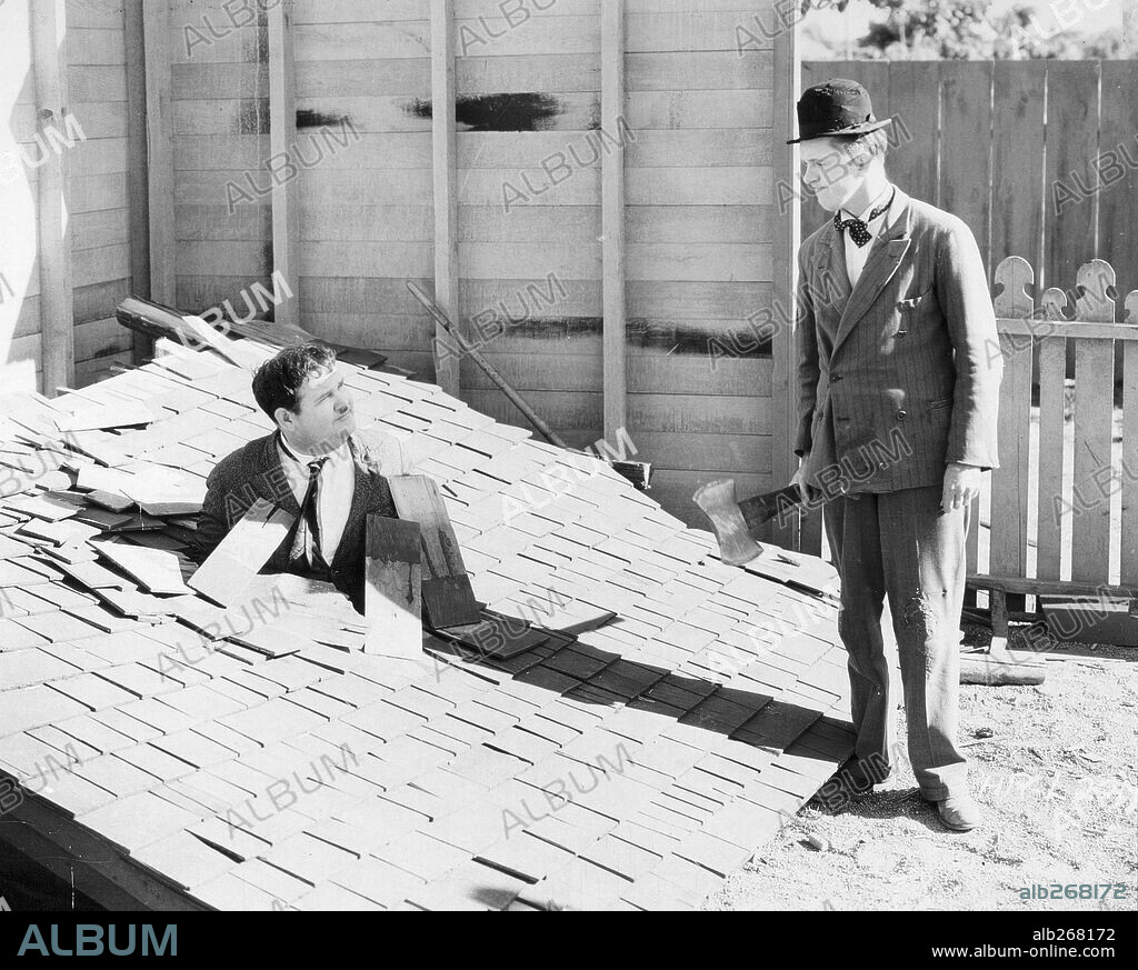OLIVER HARDY and STAN LAUREL in ONE GOOD TURN, 1931, directed by JAMES W. HORNE. Copyright HAL ROACH/MGM.