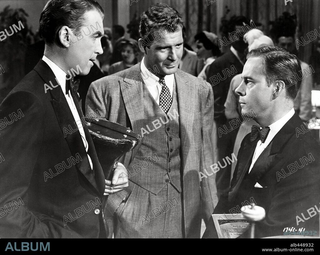 CHARLES DRAKE, HARRY MORGAN and JAMES STEWART in THE GLENN MILLER STORY, 1953, directed by ANTHONY MANN. Copyright UNIVERSAL PICTURES.