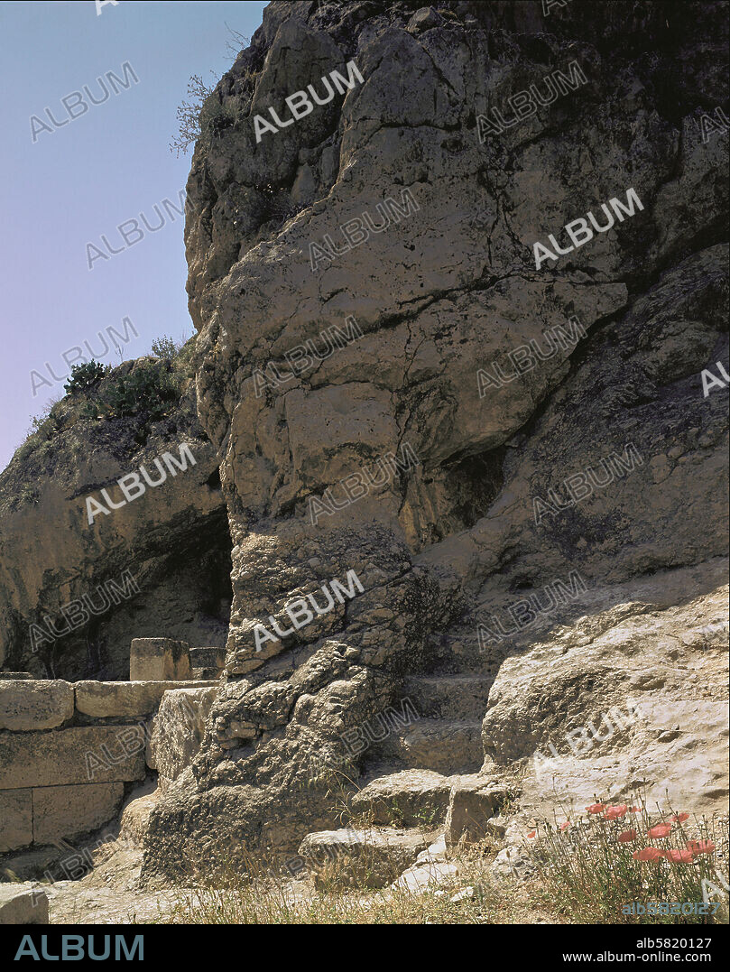 The Plutonion, sanctuary of Hades, Eleusis. The grotto behind the temple of Pluto was believed to be the gateway to Hades, the Netherworld. According to myth, this is the place of Persephone's abduction and return.