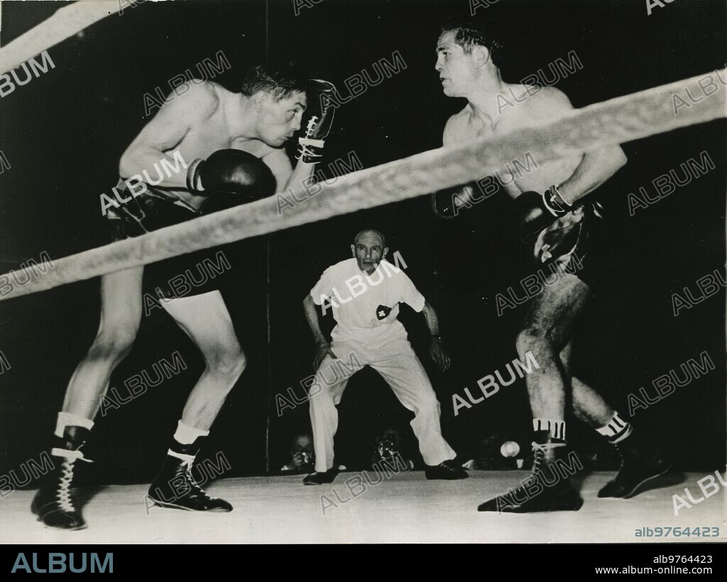 Paris. 11/03/1955. Fred Galiana won the European featherweight title on November 3, 1955 at the Palais des Sports in Paris against the French continental champion Ray Famechon, winning by abandonment in the seventh round. Galiana gave such a spectacle that the French nicknamed him Le toreador du ring.