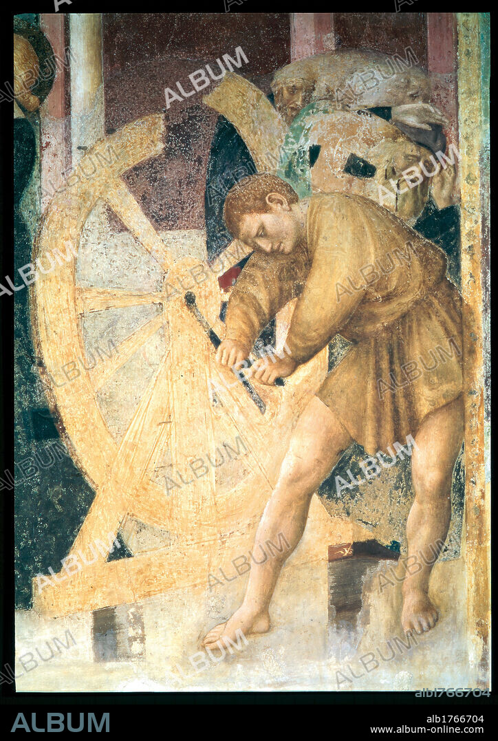 The Martyrdom of St Catherine, by Tommaso di Cristofano Fini known as Masolino da Panicale, 1425-1428 about, 15th Century, fresco,. Italy, Lazio, Rome, San Clemente Basilica, St Catherine chapel. Detail. The hireling operating the wheel of torture.