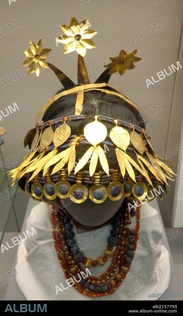 Headdress of Princess Puabi. Sumerian, 2600 BC. Silver head ornament with gold, lapis lazuli, shell and red limestone inlay. Held at the British Museum, London. (Photo by: Universal History Archive/UIG via Getty Images).