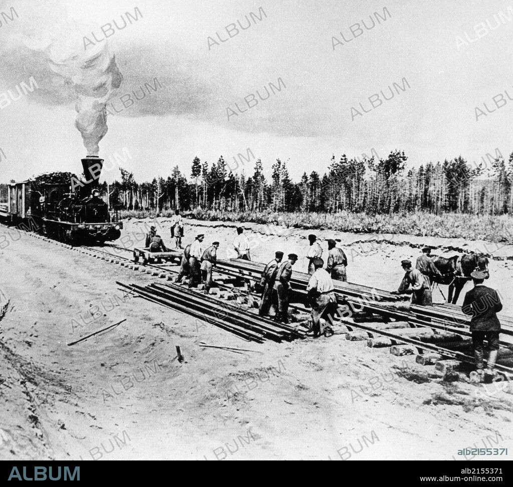 Workers laying track for the central portion of the trans-siberian railroad in the krasnoyarsk region of russia, 1899, this section of the railway runs between the ob and yenisey rivers. 01/02/2013