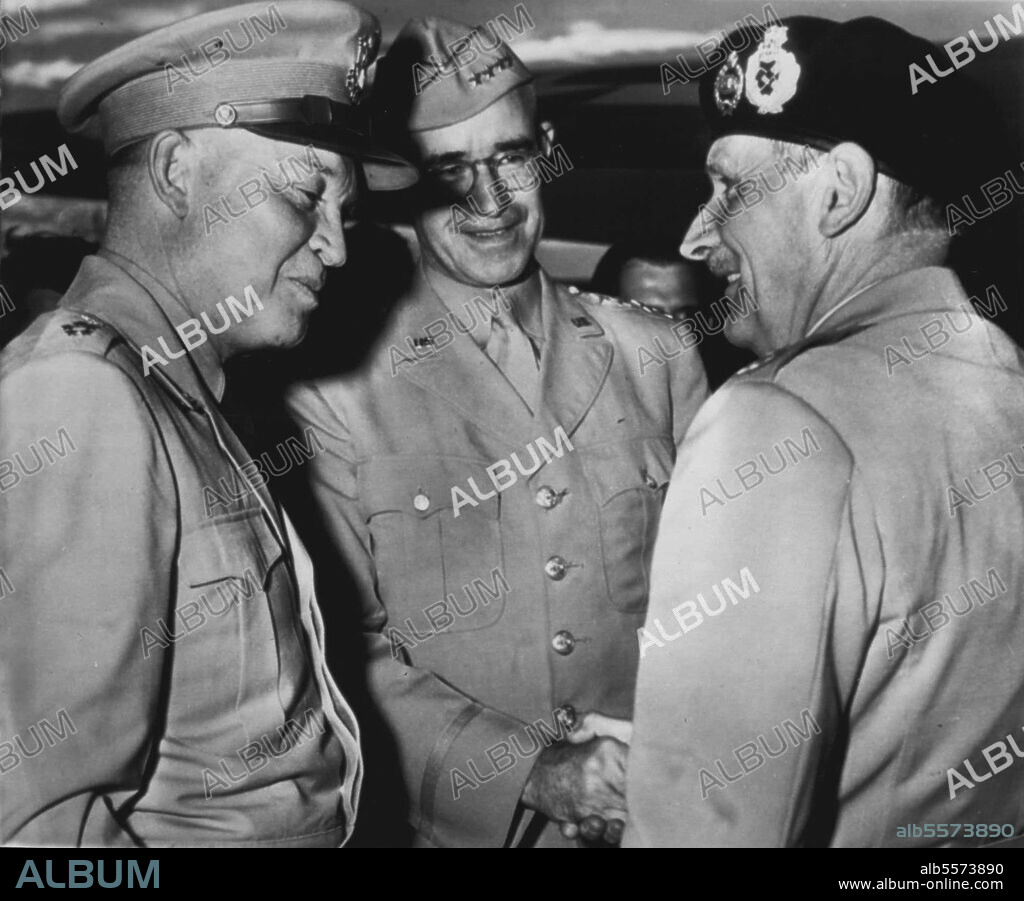 Interchange -- Turning from Gen. Dwight Eisenhower (left), Field Marshal Montgomery (right), British Chief of Ike. Gen Omar Bradley (center), greets Montgomery on latter's arrival at National Airport late yesterday. September 11, 1946. (Photo by AP Wirephoto).