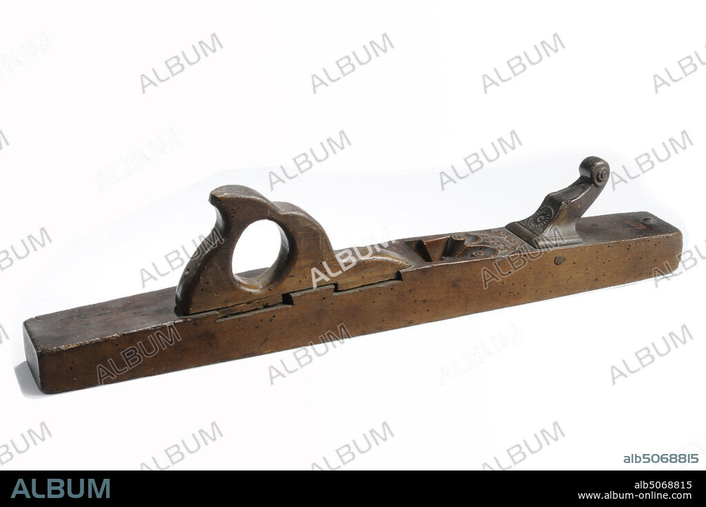 planer, Anonymous, 1760, wood, iron, General: 13 x 37.3 x 8.4cm (130 x 373 x 84mm), Wooden planer type predecessor. The planer consists of an elongated wooden block with a groove all around for handling. The chisel is placed about half way and the block rises slightly from both sides to the chisel. The wedge protrudes into the chisel opening and a curly cartridge is cut in front of the opening, bearing the year 1760. The curls run spatially downwards into the knife opening. Three marks are stamped on the front, 1892.
