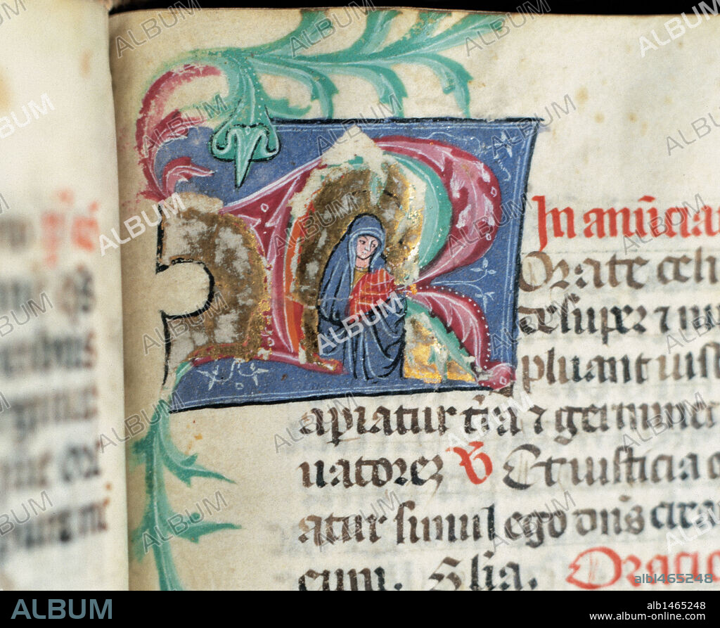 CODICE Nº 135. S. XIV. "MISSALE ROMANUM CUM CALENDARIO". "LA VIRGEN MARIA CON EL NIÑO JESUS EN SU REGAZO". Miniatura de la letra capitular del folio 148 v. Archivo Capitular de Tarazona. Provincia de Zaragoza. Aragón. España.