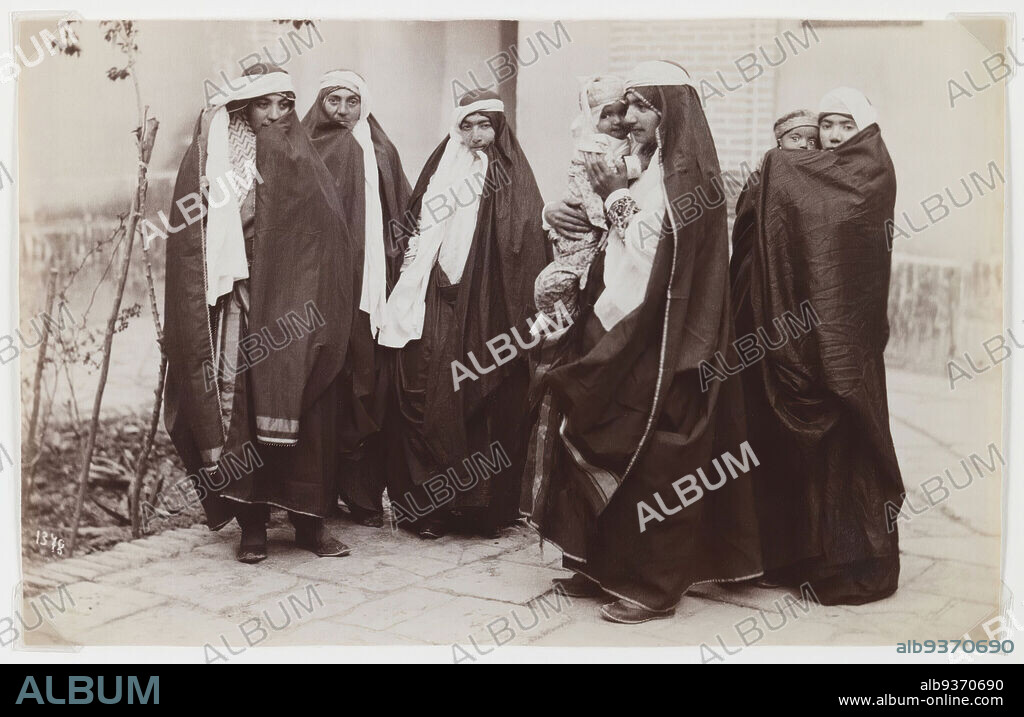 Group Veiled Women with a Baby, Attributed to Antoin Sevruguin, Albumen silver photograph, late 19th century, Qajar, Qajar Period, 5 3/16 x 8 3/16 in., 13.2 x 20.8 cm, baby, black, chador, children, family, hijab, infant, Iran, maternity, Middle East, mother, Persia, photograph, photography, portrait, robes, veil, white, women.