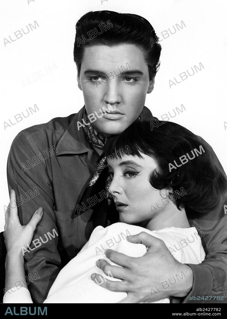 CAROLYN JONES and ELVIS PRESLEY in KING CREOLE, 1958, directed by MICHAEL CURTIZ. Copyright PARAMOUNT PICTURES.