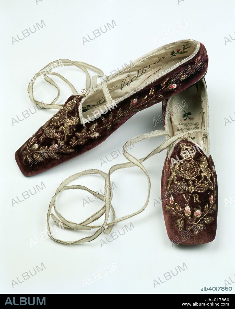 Shoes presented to Queen Victoria after her accession, c1838. They are silk velvet embroidered with polychrome silks and metal thread.