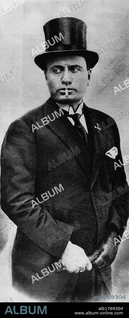 Benito Mussolini smoking a cigarette. The Head of the Italian Government Benito Mussolini smoking a cigarette. Italy, 1924.