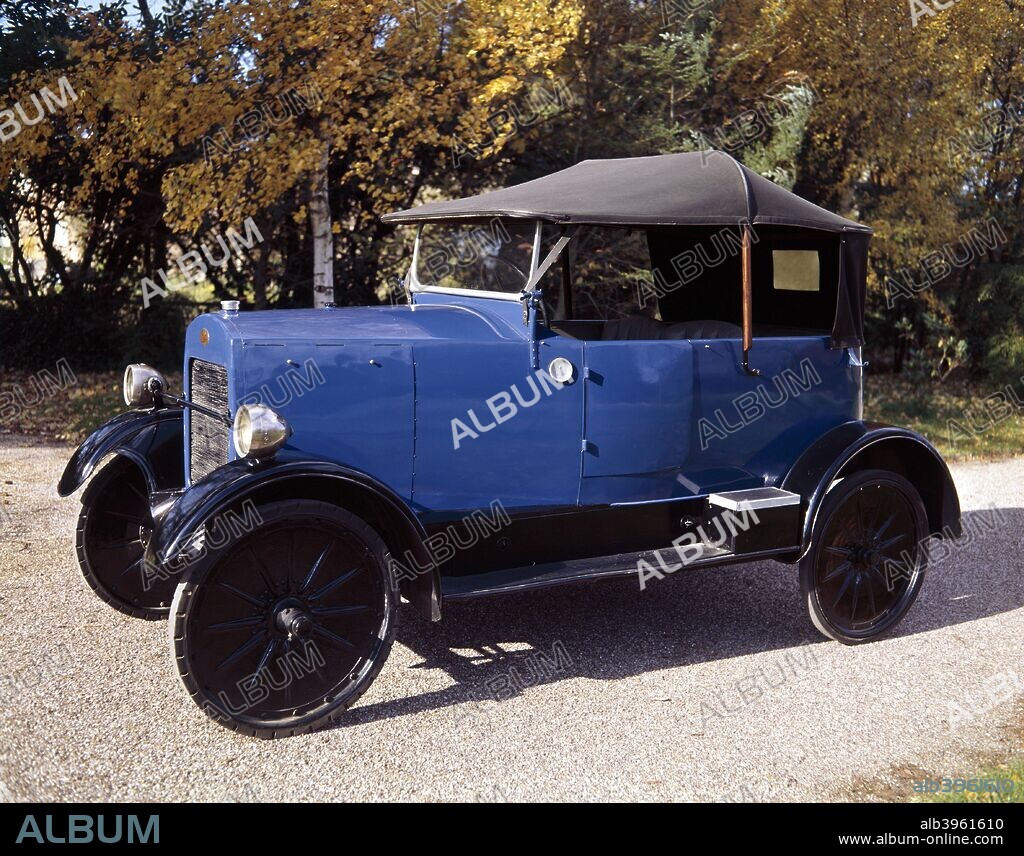 A 1924 Trojan. Promoted with the slogan 'Can you afford to walk?' it was one of the few cars ever advertised in 'The Church Times'. The engine, which is housed under the floorboards, contains only seven moving parts, was extremely reliable and the car could climb anything on which its wheels could get a grip. The only drawback was its narrow solid tyres which could fall into tramlines.
