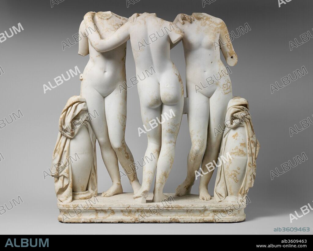 Marble Statue Group of the Three Graces. Culture: Roman. Dimensions: Overall: 48 7/16 x 39 3/8in. (123 x 100cm). Date: 2nd century A.D..
Roman copy of a Greek work of the 2nd century B.C.
These young girls, linked in a dance-like pose, represent The Three Graces: Aglaia (Beauty), Euphrosyne (Mirth), and Thalia (Abundance). They bestow what is most pleasurable and beneficent in nature and society: fertility and growth, beauty in the arts, harmonious reciprocity between men. They enjoyed venerable cults in Greece and Asia Minor. In mythology, they play an attendant role, gracing festivals and organizing dances. Their closest connection is with Aphrodite, whom they serve as handmaidens.
This carefully calculated, frieze-like composition is typical of classicizing art of the second and first centuries B.C. Instantly recognizable, it soon became the canonic formula for representing the Graces, who appeared in every medium and on every kind of object, from mirrors to sarcophagi.