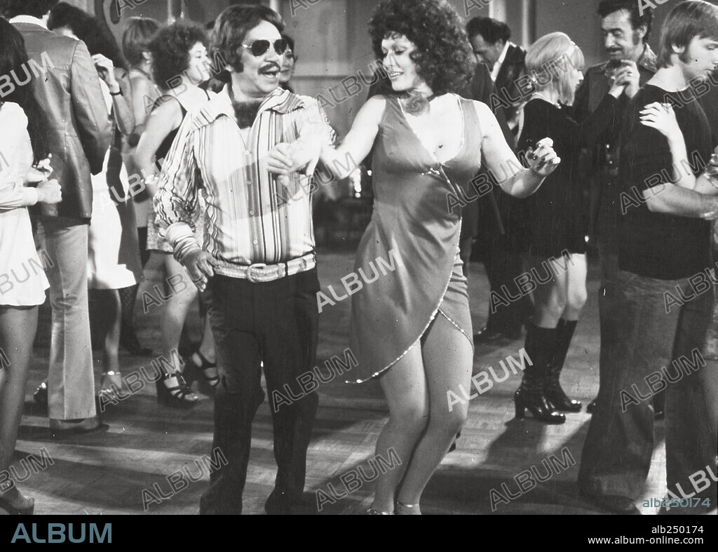 ANA BERTHA LEPE and CANTINFLAS in EL PATRULLERO 777, 1978, directed by MIGUEL M. DELGADO.