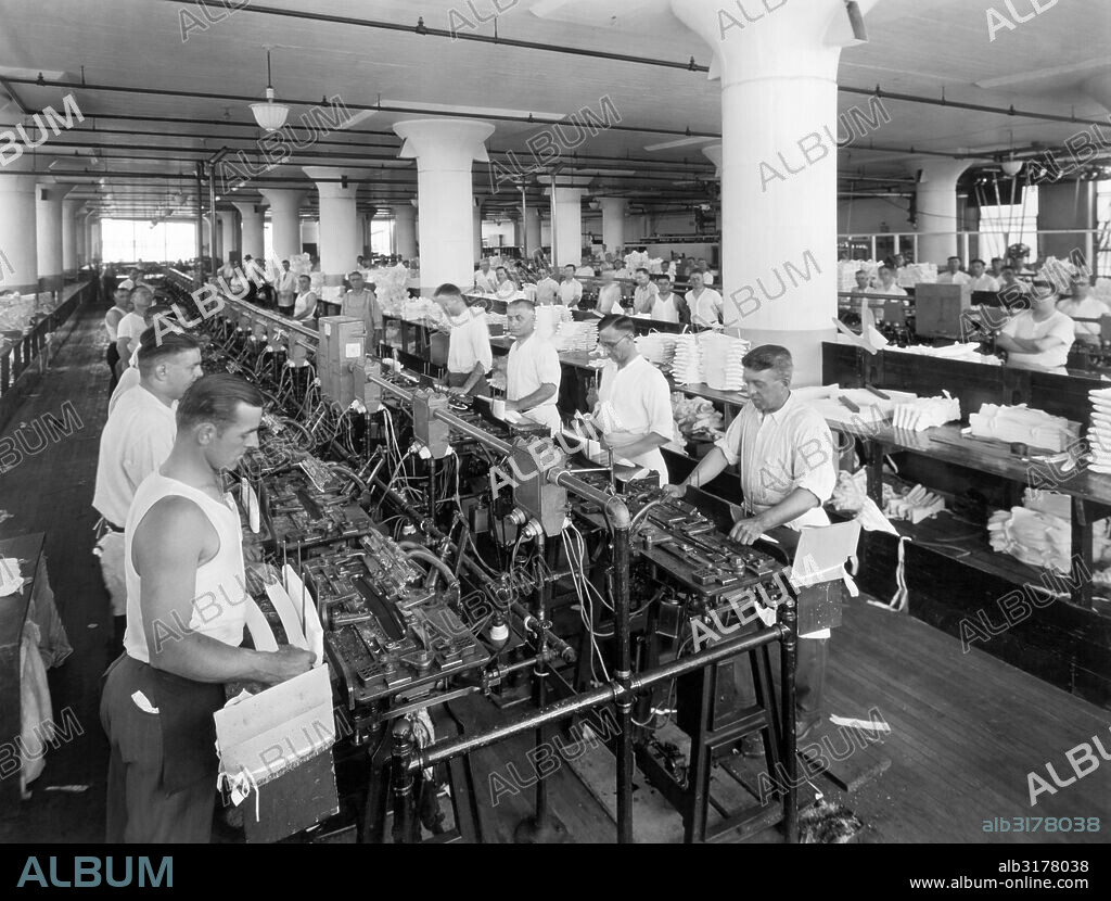 Troy, New York:  c. 1933 The collar turning department in the clothing factory of Cluett Peabody & Co., manufacturer of Arrow brand shirts.   © Underwood Archives / The Image Works.