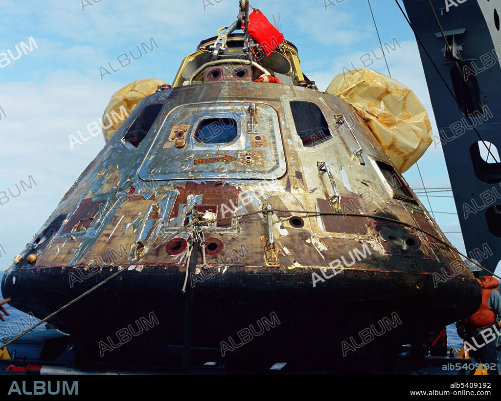 CM-107, alias the Apollo 11 Command Module Columbia, aboard the recovery ship USS Hornet. Apollo 11 was the spaceflight that landed the first two people on the Moon. Commander Neil Armstrong and lunar module pilot Buzz Aldrin landed the Apollo Lunar Module Eagle on July 20, 1969. Armstrong became the first person to step onto the lunar surface six hours later on July 21; Aldrin joined him 19 minutes later. They spent about two hours together outside the spacecraft, and collected 47.5 pounds of lunar material to bring back to Earth. Command module pilot Michael Collins flew the command module Columbia alone in lunar orbit while they were on the Moon's surface. Armstrong and Aldrin spent 21.5 hours on the lunar surface before rejoining Columbia in lunar orbit.