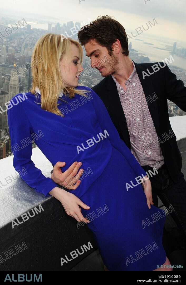 June 25, 2012 - Manhattan, New York, U.S. - ANDREW GARFIELD and EMMA STONE on the 103rd floor parapet. The Amazing Spider-Man's Andrew Garfield, Emma Stone, Rhys Ifans, Denis Leary, director Marc Webb and producer Matt Tolmach light the Empire State Building red and blue and tour the 86th floor Observatory and 103rd floor parapet. 25/06/2012