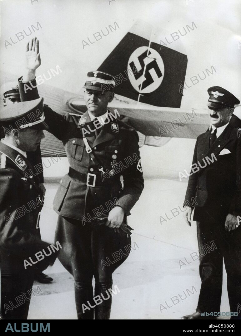 Viktor Lutze, commander of the SA, Munich Airport, Germany, 1934. Founded in c1919, the Sturmabteilung (SA) was the paramilitary wing of the Nazi party. Its members were known as the 'Brownshirts' because of the colour of their uniforms. The SA played an important part in Hitler's rise to power in Germany but its significance was greatly reduced after its leaders, including Ernst Röhm, were killed in the 'Night of the Long Knives' in 1934, with the rival Schutzstaffel (SS) taking over its role. Lutze (1890-1943) succeeded Röhm as head of the SA. He had been instrumental in bringing about his predecessor's downfall, informing Hitler of his anti-regime plotting.