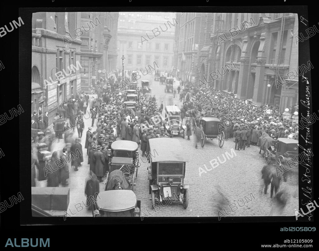 Crowd of people gathered for the garment workers' strike on Lasalle Street, north from Van Buren Street, Chicago, Illinois, 1910.