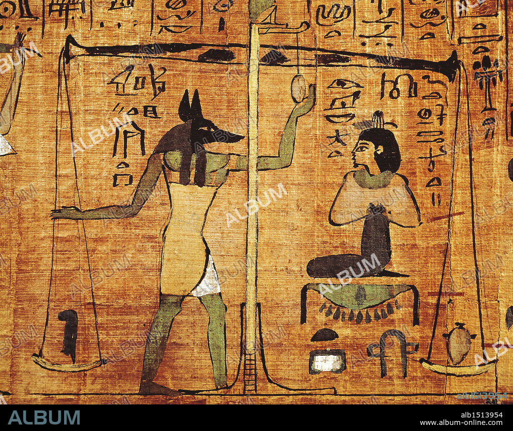 Egyptian civilization. Papyrus from 'The Book of The Dead': Anubi during the weighing of the souls (psychostasy).
