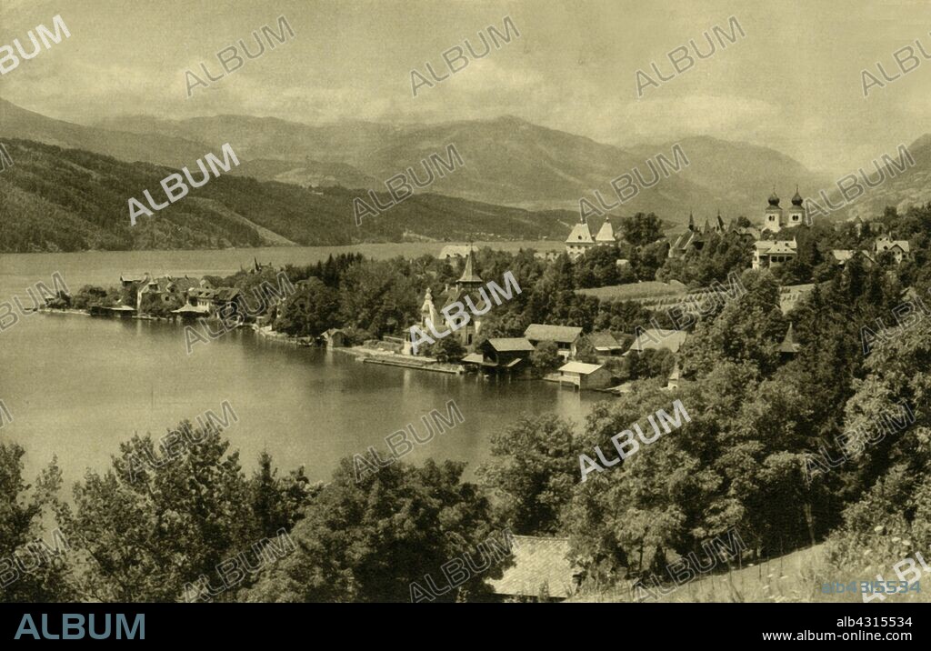 Millstatt am See, Carinthia, Austria, c1935. View of the health resort and spa town of Millstatt on the Millstätter See (Lake Millstatt), in the state of Carinthia. From "Österreich - Land Und Volk", (Austria, Land and People). [R. Lechner (Wilhelm Müller), Vienna, c1935].