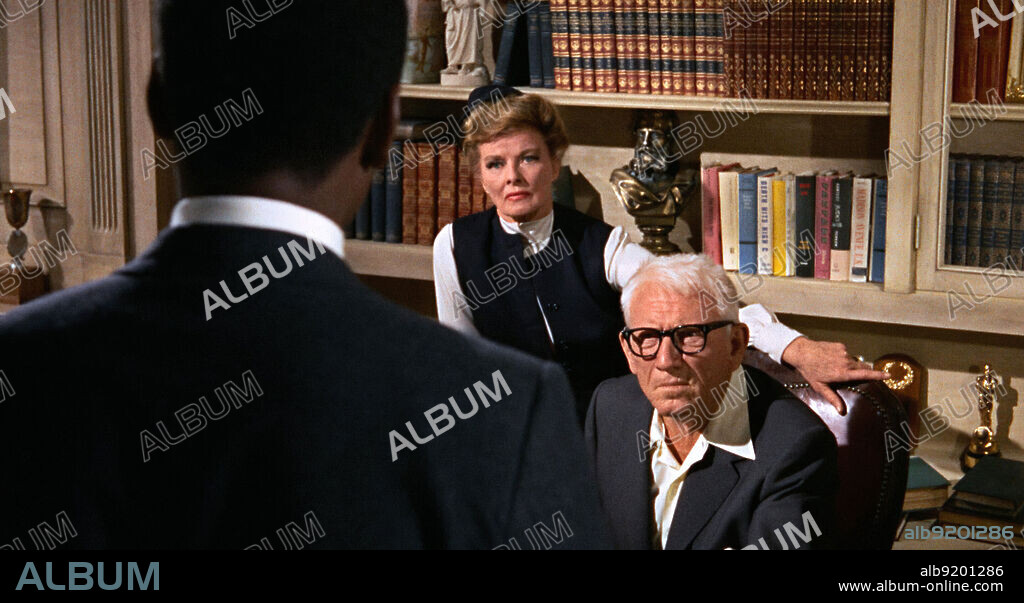 KATHARINE HEPBURN, SIDNEY POITIER and TRACY SPENCER. KATHARINE HEPBURN, SIDNEY POITIER and SPENCER TRACY in GUESS WHO'S COMING TO DINNER, 1967, directed by STANLEY KRAMER. Copyright COLUMBIA PICTURES.