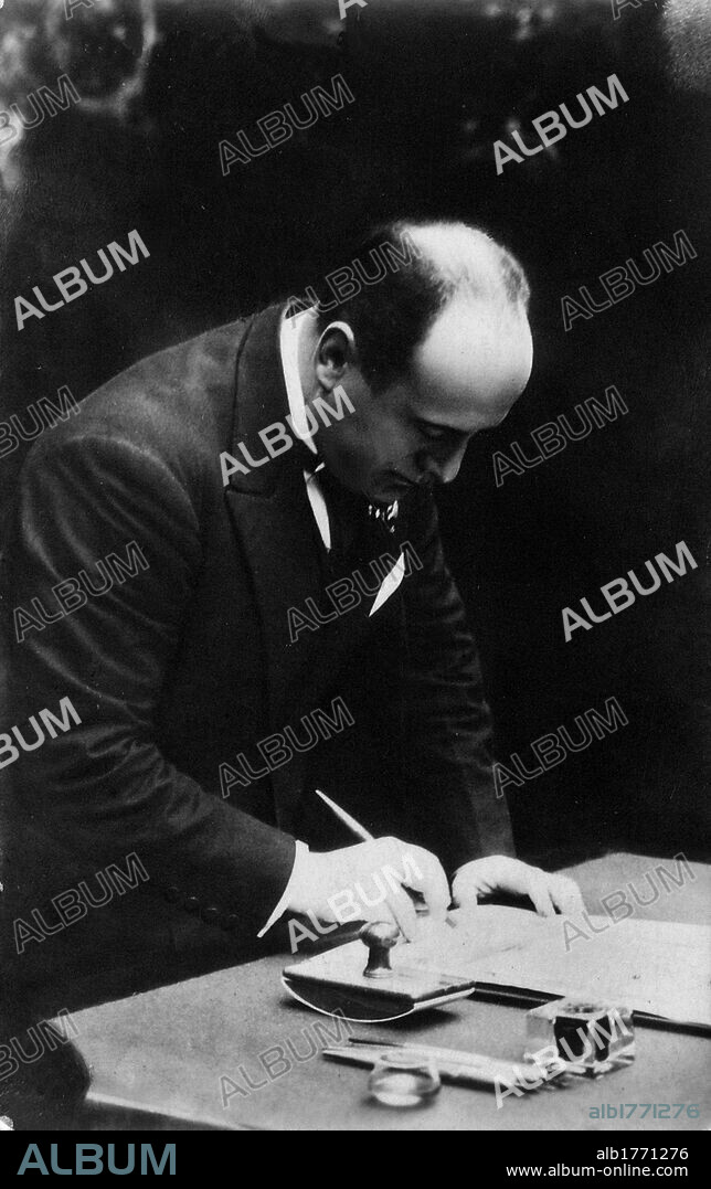Benito Mussolini signing a document. The Head of the Italian Government Benito Mussolini signing the first document after his appointment. Rome, 31st October 1922.