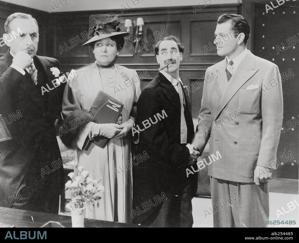GROUCHO MARX, MARGARET DUMONT and TONY MARTIN in THE BIG STORE, 1941, directed by CHARLES REISNER. Copyright M.G.M.