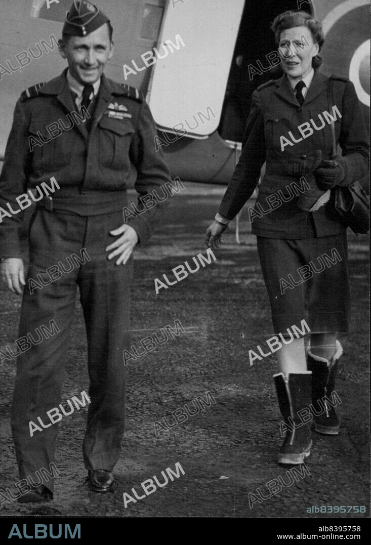 Air Marshal sir Arthur Tedder Arrives In England -- Air Marshal Sir Arthur Tedder and Lady Tedder photographed as they left their plane on arrival in England. Air Marshal A. Tedder, accompanied by Lady Tedder, arrived in England today to take up his post as Deputy Supreme Commander. He was formerly Air Officer Commanding-in-Chief in the Middle East. January 20, 1944. (Photo by.