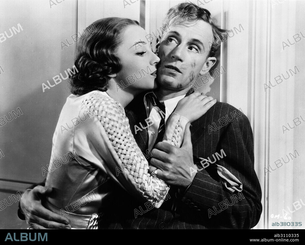 LESLIE HOWARD and OLIVIA DE HAVILLAND in IT'S LOVE I'M AFTER, 1937, directed by ARCHIE MAYO. Copyright WARNER BROS PICTURES.
