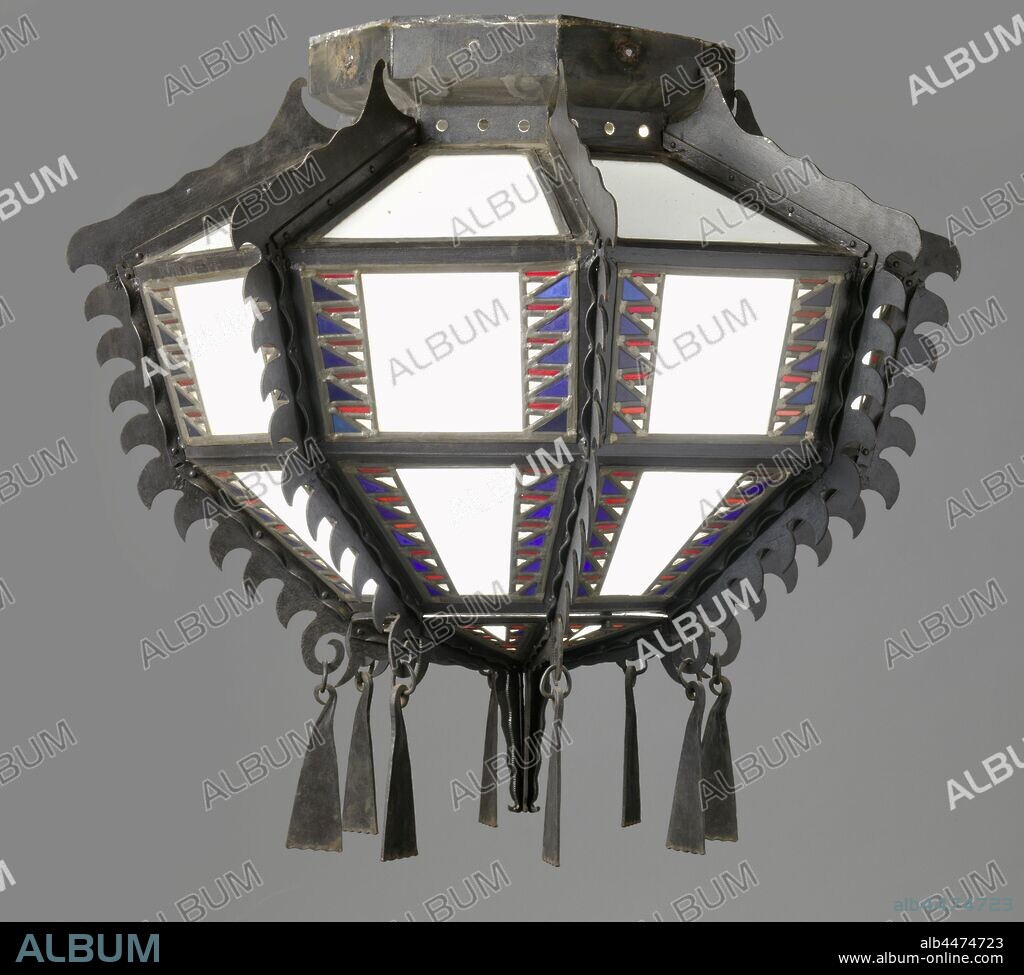 Lamp consisting of eight sides with ribs in irregular curved point shapes, Lamp resting on an octagonal floor plan with an eight-side metal frame on it. The eight sides each have three beveled sides that are filled with white glass. The sides in the middle and at the top contain a lead frame on either side of the white glass in a zigzag pattern that is filled with red and blue glass. The metal ribs between the eight sides contain wavy lines and raised curved erratic point shapes. The ribs terminate at the top in a curl with a metal triangle shaped by means of an eye and a ring. The top of the lamp consists of eight vertical strips of metal with a wavy edge that come together at the top and serve as a suspension hook., Joseph Crouwel, Netherlands, c. 1920, iron (metal), h 87.0 cm × d 100.0 cm.