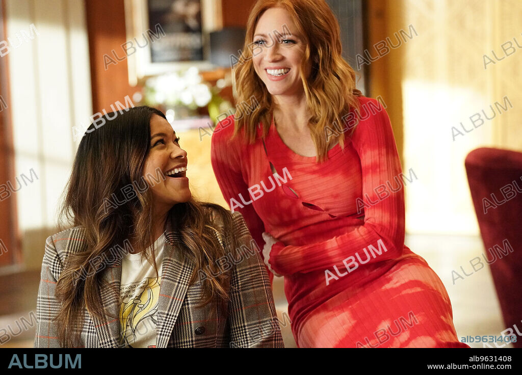 BRITTANY SNOW and GINA RODRIGUEZ in NOT DEAD YET, 2023, directed by TODD HOLLAND. Copyright 20th Television.