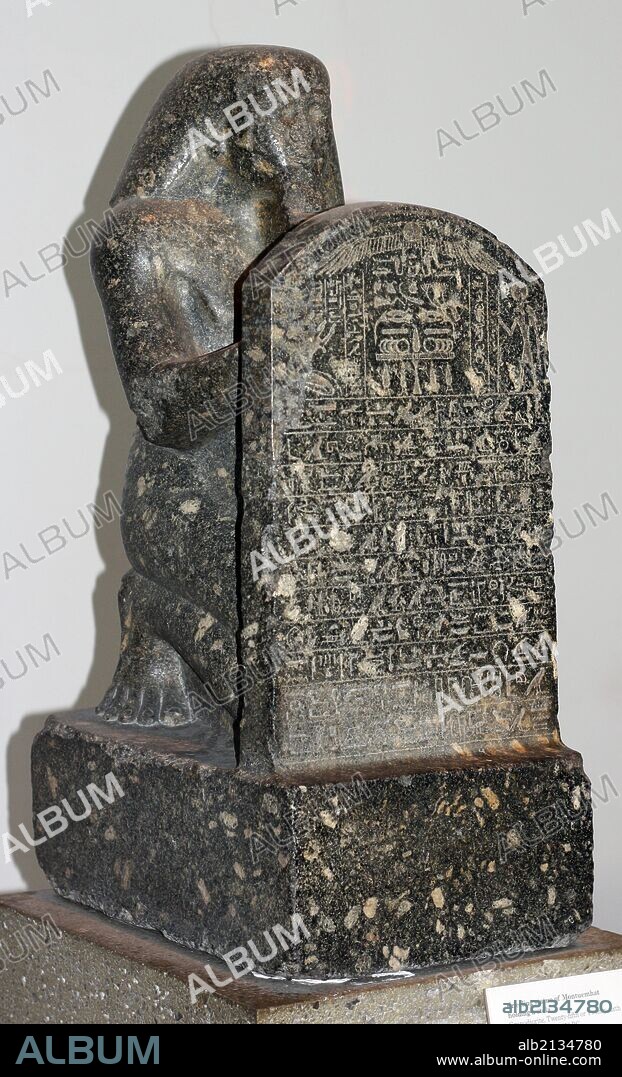 Statue of Montuemhat kneeling and holding up a stele. 25th or 26th Dynasty (approx. 670-650 BC) Egyptian. Made from Granodiorite. The stele shows the prophet Montuemhat offering to Atum-Khepri, and contains text from the Book of the Dead. (Photo by: Universal History Archive/UIG via Getty Images).