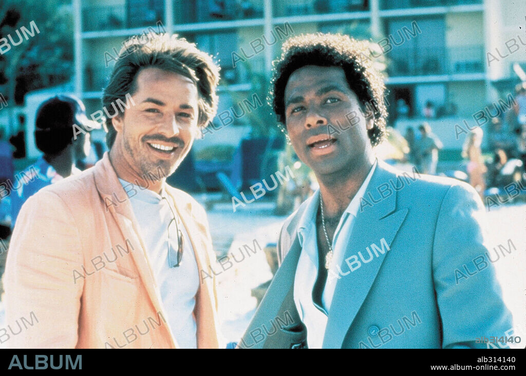 DON JOHNSON and PHILIP MICHAEL THOMAS in MIAMI VICE, 1984, directed by JOHN NICOLELLA, LEON ICHASO and RICHARD COMPTON. Copyright UNIVERSAL TV.