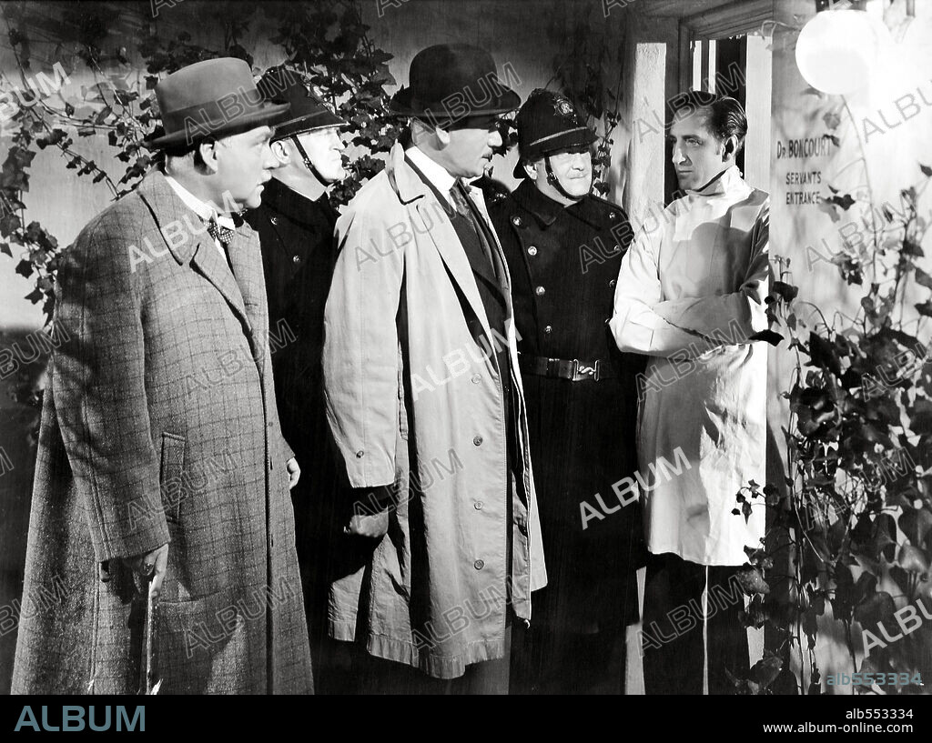 BASIL RATHBONE and NIGEL BRUCE in THE PEARL OF DEATH, 1944, directed by ROY WILLIAM NEILL. Copyright UNIVERSAL PICTURES.