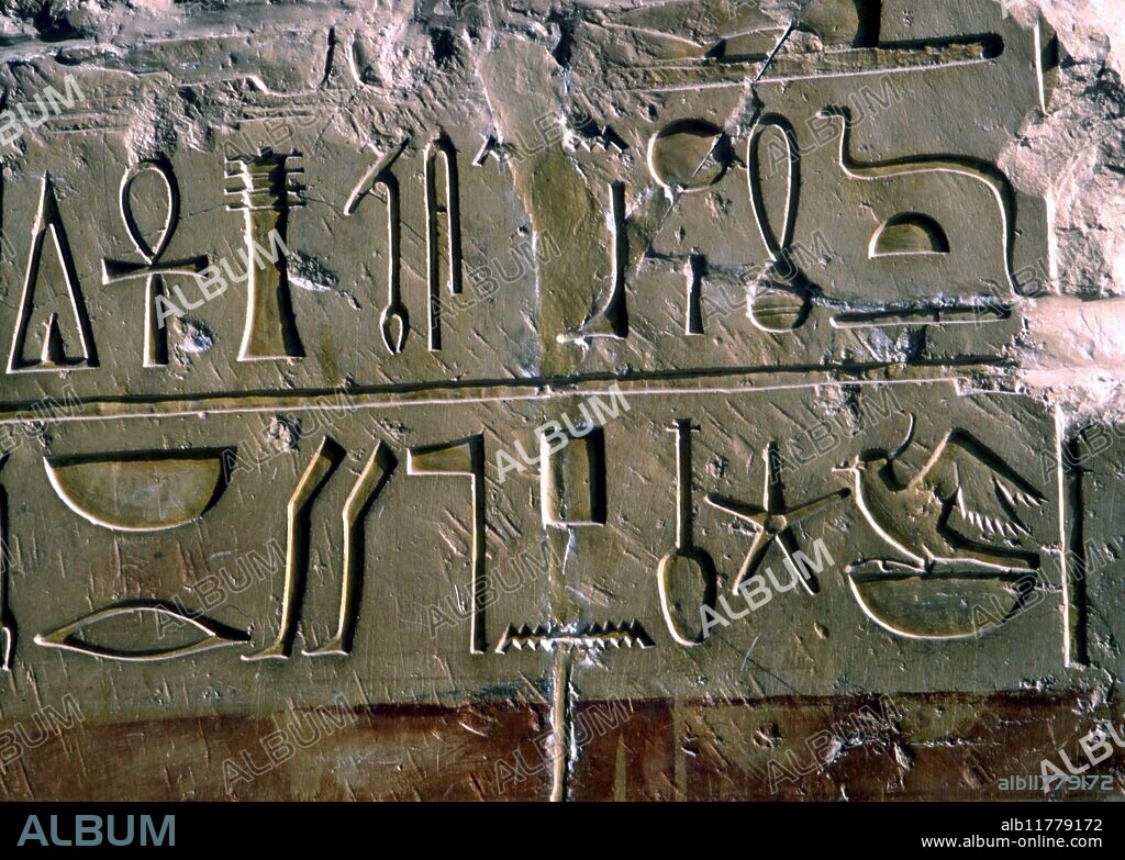 EGYPTIAN MYTHOLOGY - Alphabets - hieroglyphics - details of the sacred writing on the wall of the funerary temple of Hapshepsut, Thebes near Luxor.