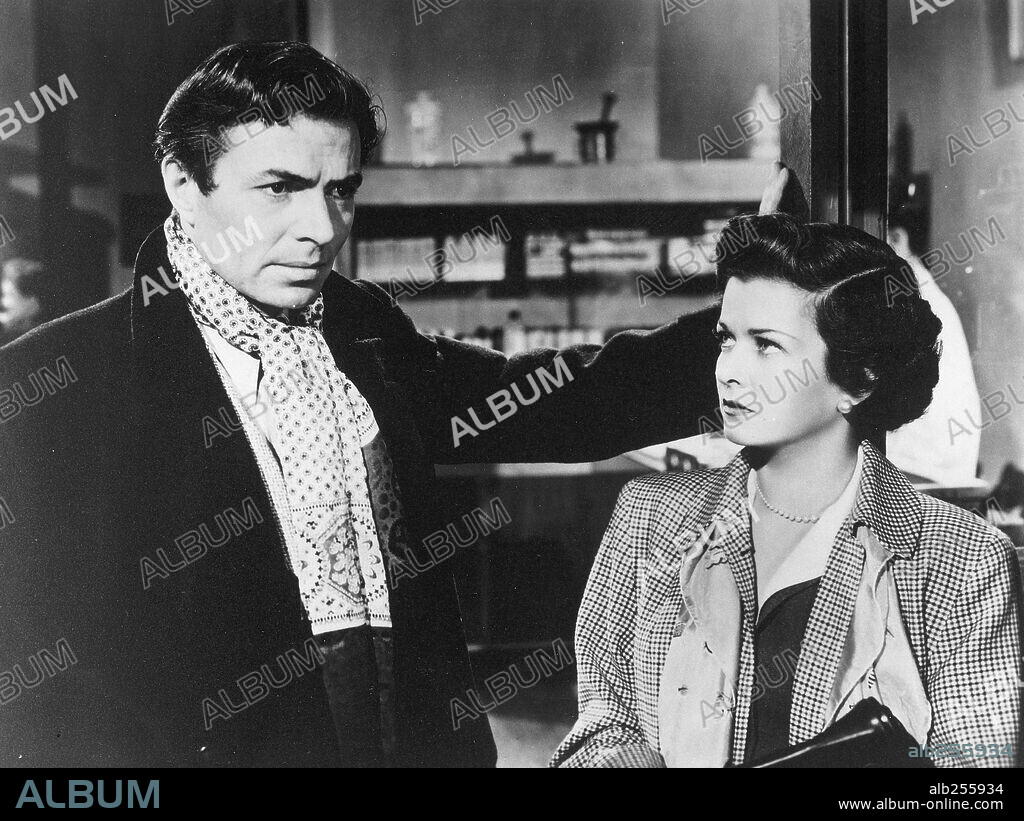 JAMES MASON y JOAN BENNETT en ALMAS DESNUDAS, 1949 (THE RECKLESS MOMENT), dirigida por MAX OPHÜLS. Copyright COLUMBIA PICTURES.